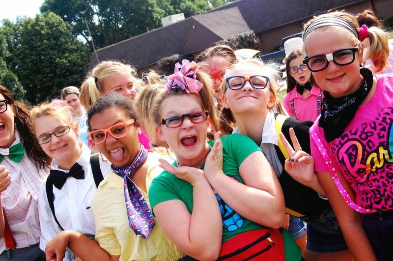 screaming girls dressed up at summer camp